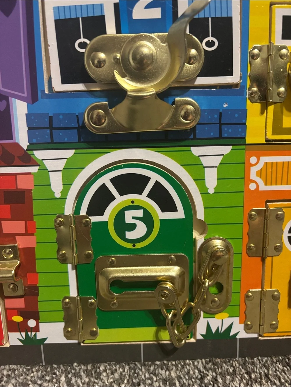 Melissa & Doug Latches Board